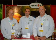 Clark Golden, Glauber Silva and Greg Golden with Amazon Produce Network with lots of mangos on display in the booth.